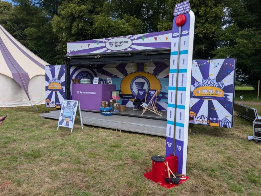Custom branded high striker at an outdoor festival brand activation