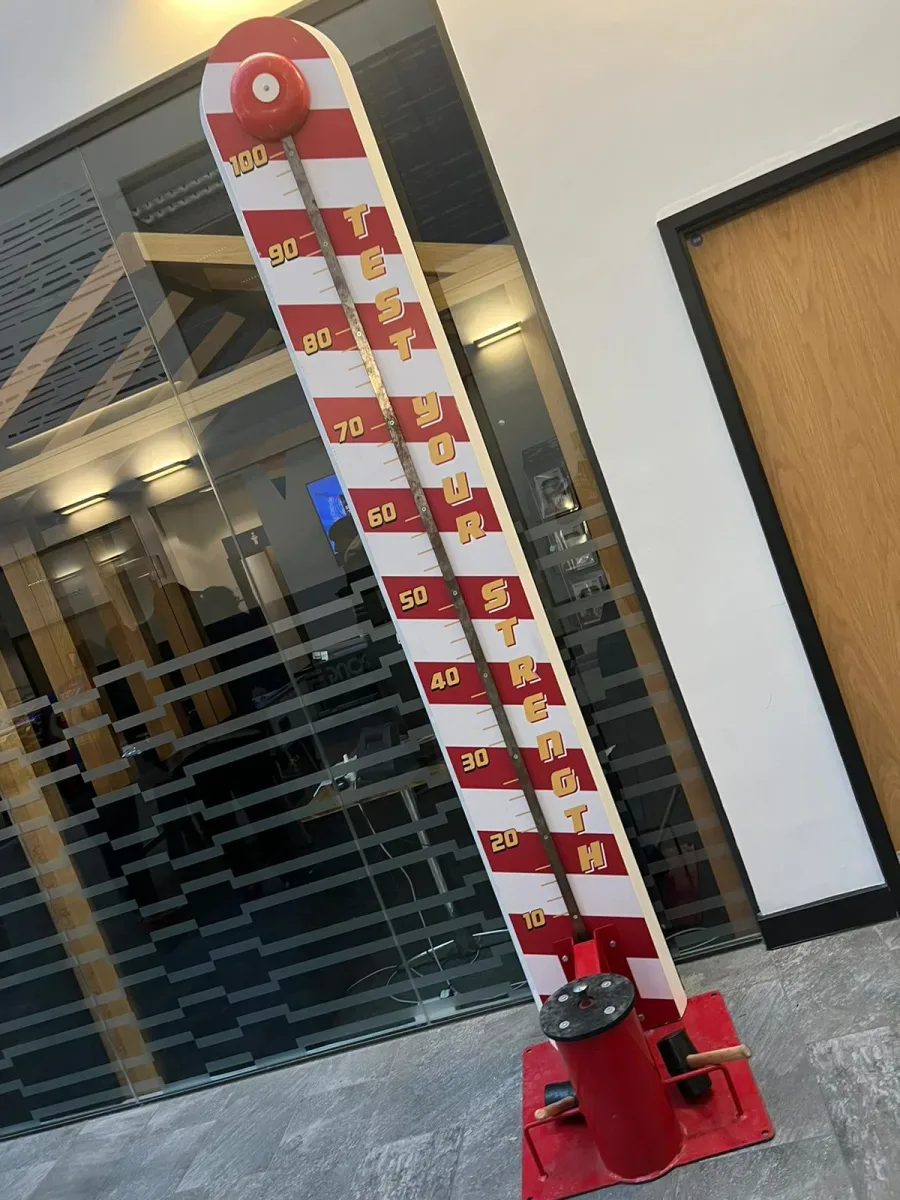 Traditional red and white high striker